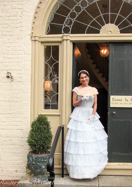 Southern belle posing for a photo in a doorway Twickenham Historic Homes