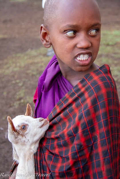 Young boy with goat