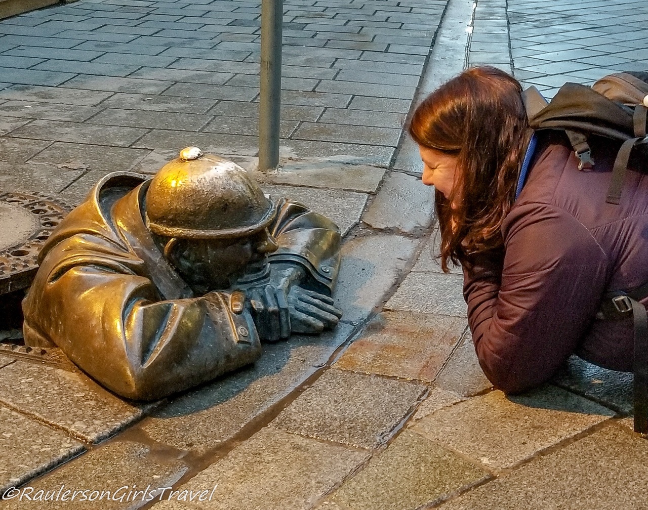 Heather with Man in Sewer - Bratislava Statue