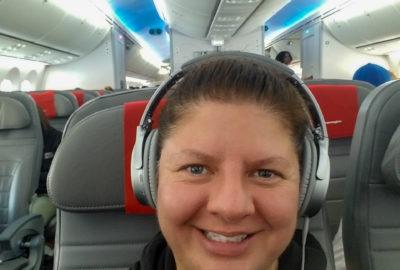 Heather traveling on a plane- Traveling Lessons