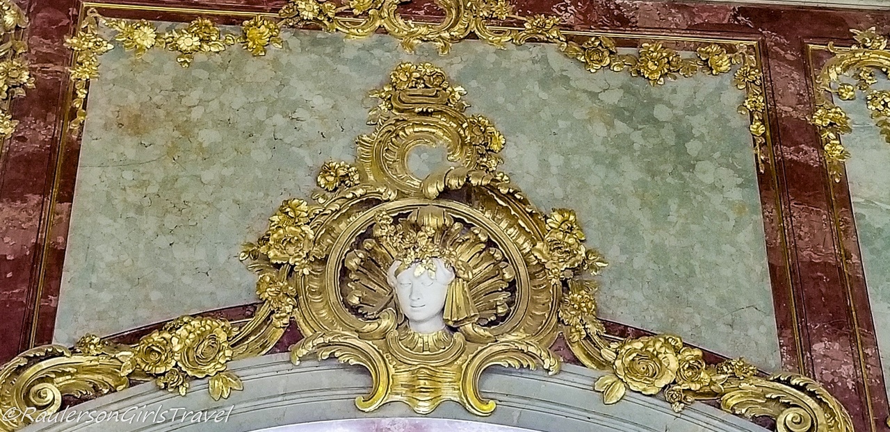 Gold leafed designed on the wall of the palace