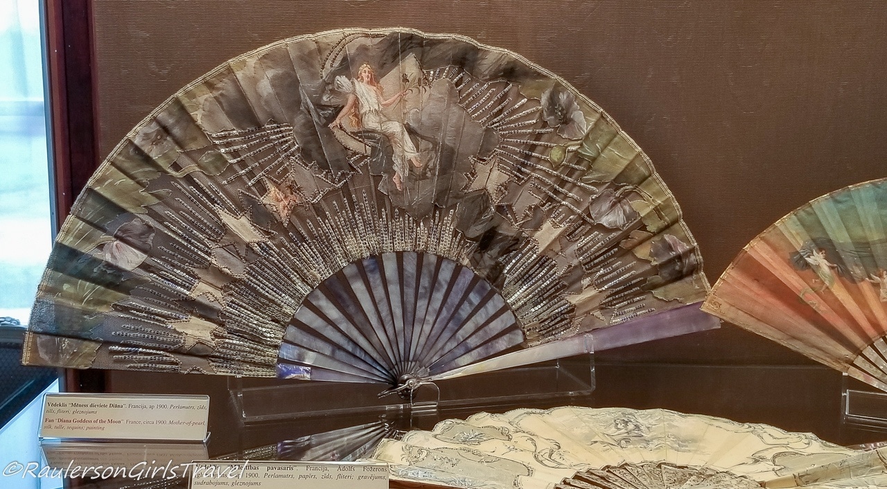 Detailed painted hand fan