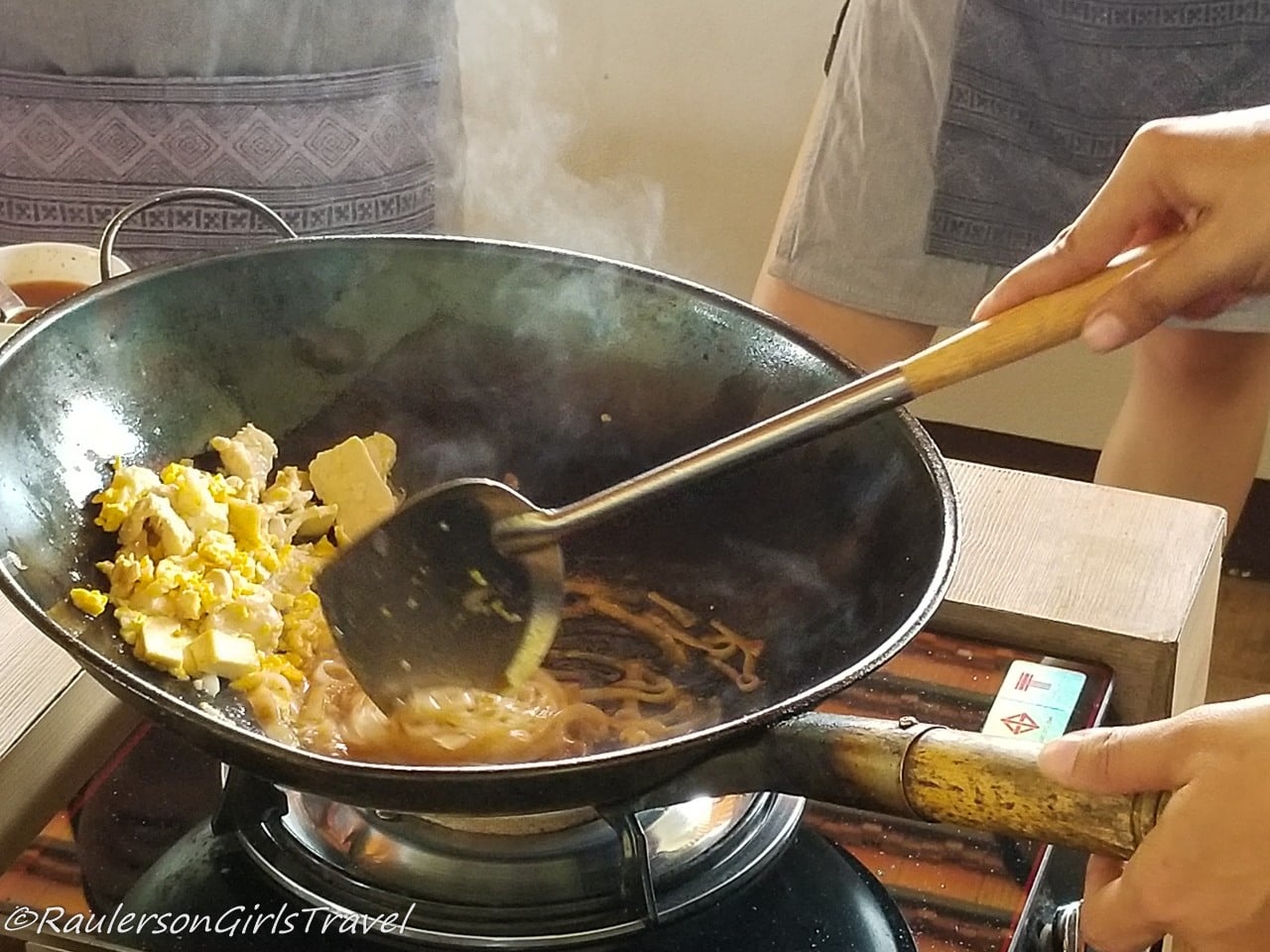 Cooking Pad Thai in a Wok