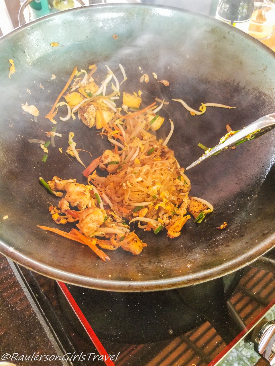 Frying Pad Thai noodles in a Wok