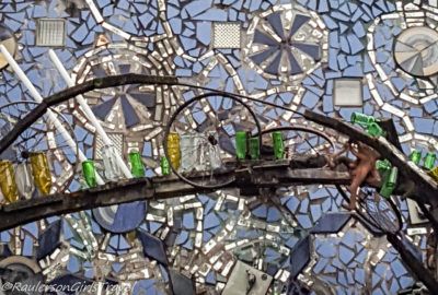Tiles, mirrors, glass bottles, and bicycle wheels in Philly's Magic Gardens