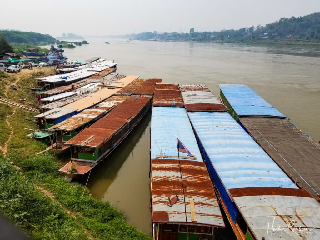 Slow boats on the bank of the Mekong River