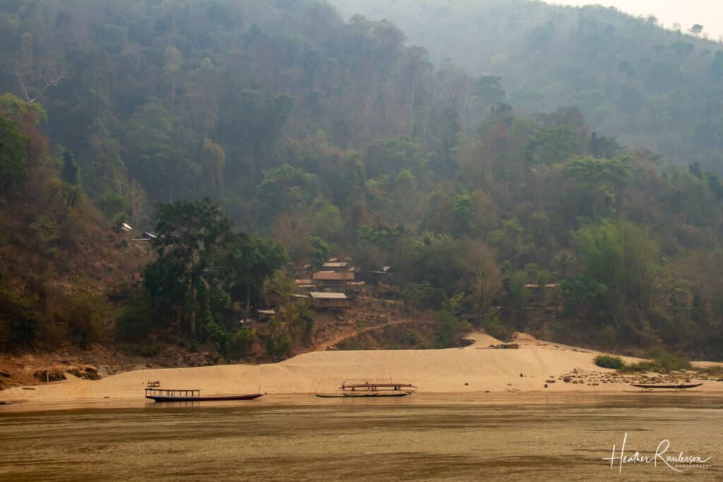 Village under Smoke Haze on the Mekong River