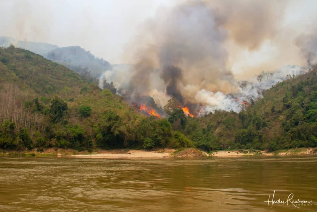 Burning of vegetation in Laos along Mekong River