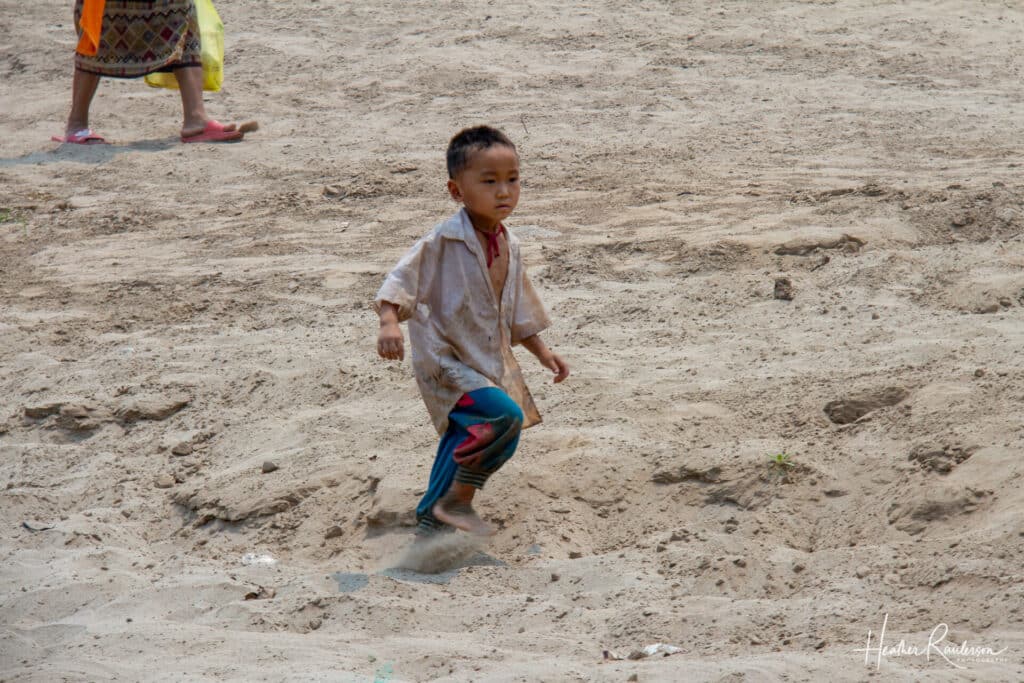 Child running in the sand