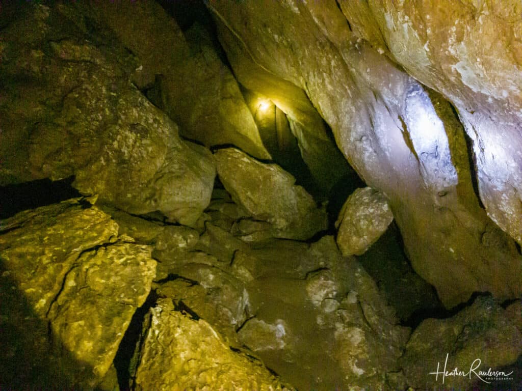 Inside Phalesi Cave of Spring at Kuang Si Falls