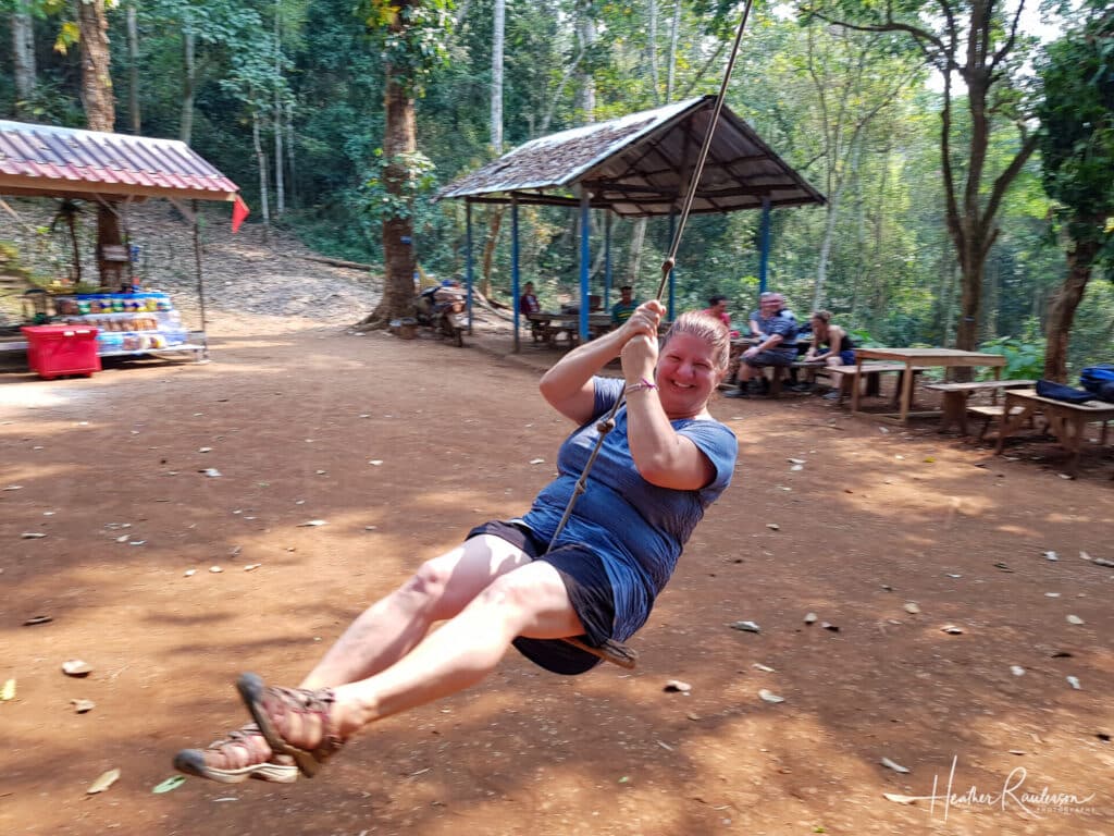 Heather swing on a tree swing at Kuang Si Falls