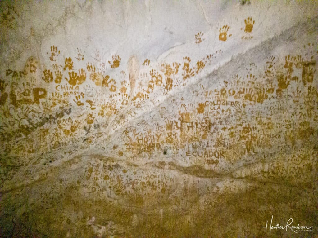 Handprints left on the cave wall in Phu Kham Cave