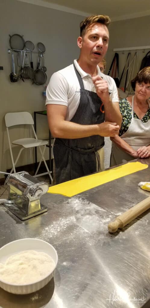 Chef Francesco explaining how to roll pasta