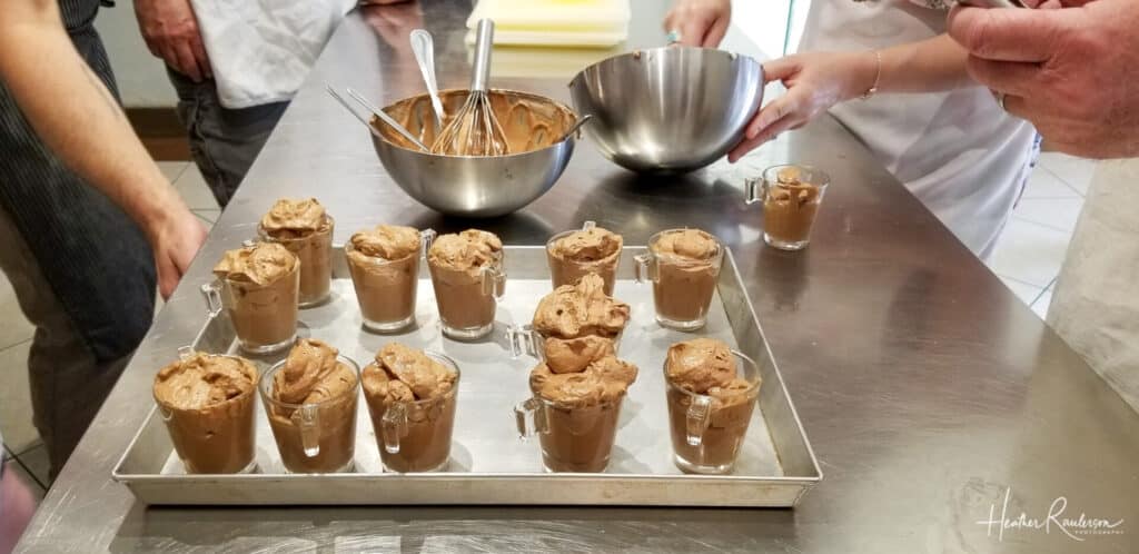 Putting Chocolate Mousse into little cups
