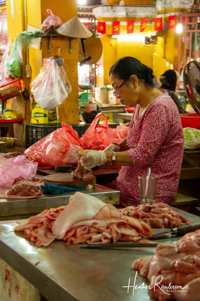 Cutting up meat at the Butchery in Hoi An