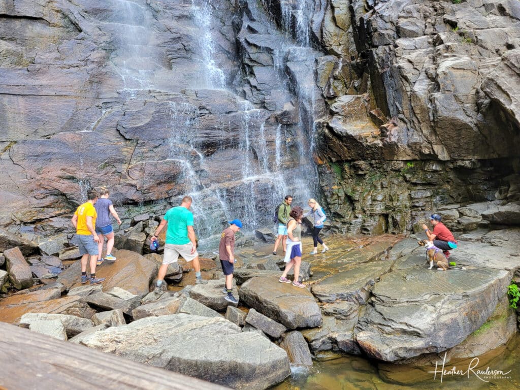 People at the bottom of Hickory Nut Falls