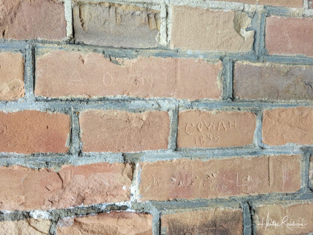 Signed bricks in the tunnel of Fort Wayne