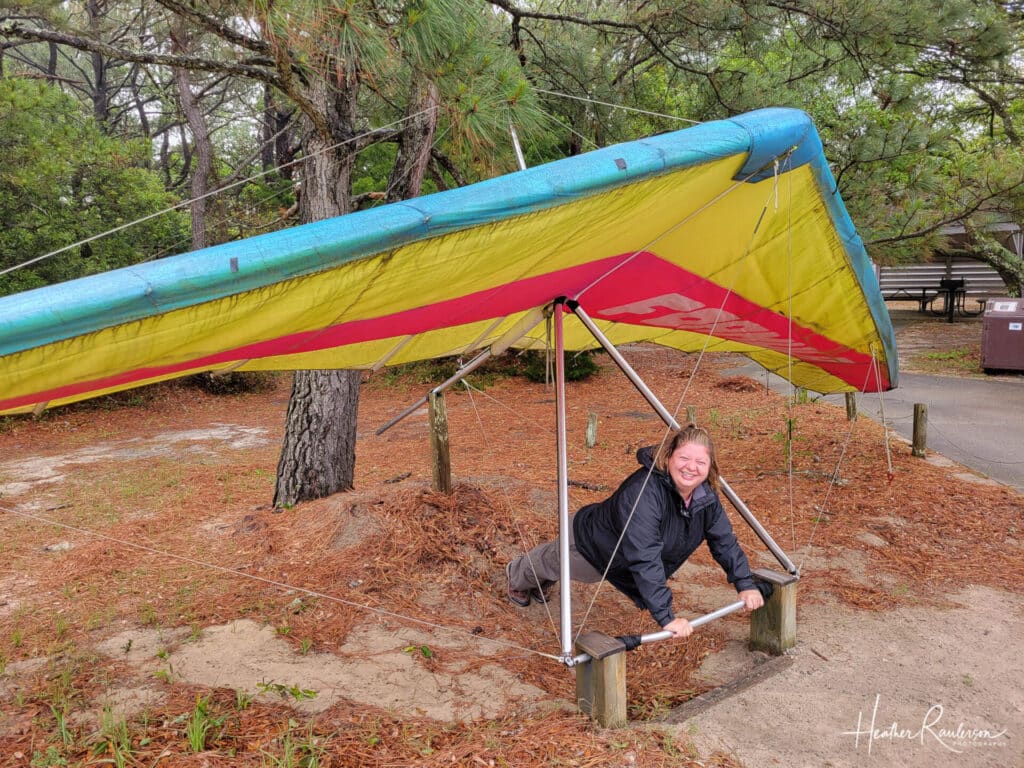 Heather posing with the hang glider